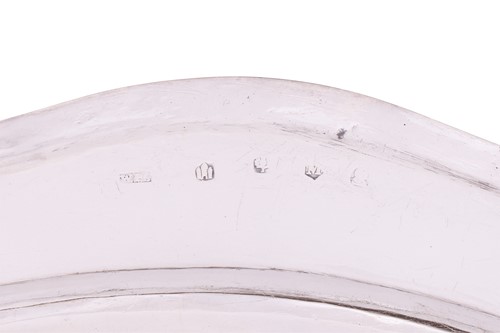 Lot 277 - A set of four George III Scottish silver meat...