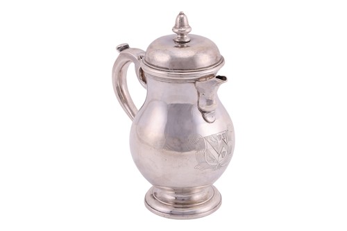 Lot 247 - A George I Scottish silver baluster jug,...