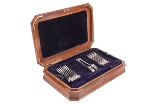Lot 283 - A case of Victorian silver forks, Lily pattern,...