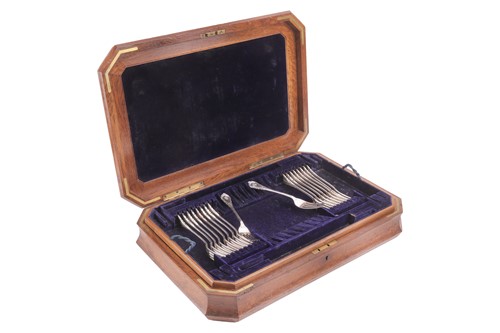 Lot 283 - A case of Victorian silver forks, Lily pattern,...