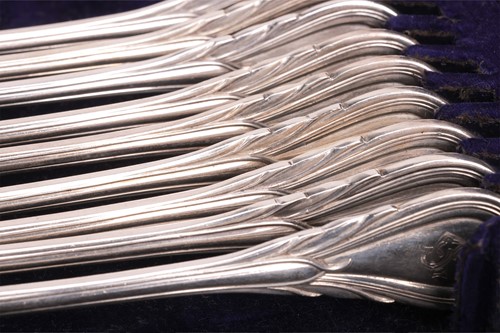 Lot 283 - A case of Victorian silver forks, Lily pattern,...