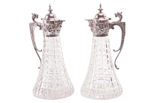 Lot 267 - A pair of silver-mounted claret jugs, by C J...
