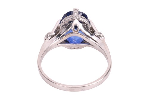 Lot 53 - An unheated Ceylon sapphire and diamond dress...