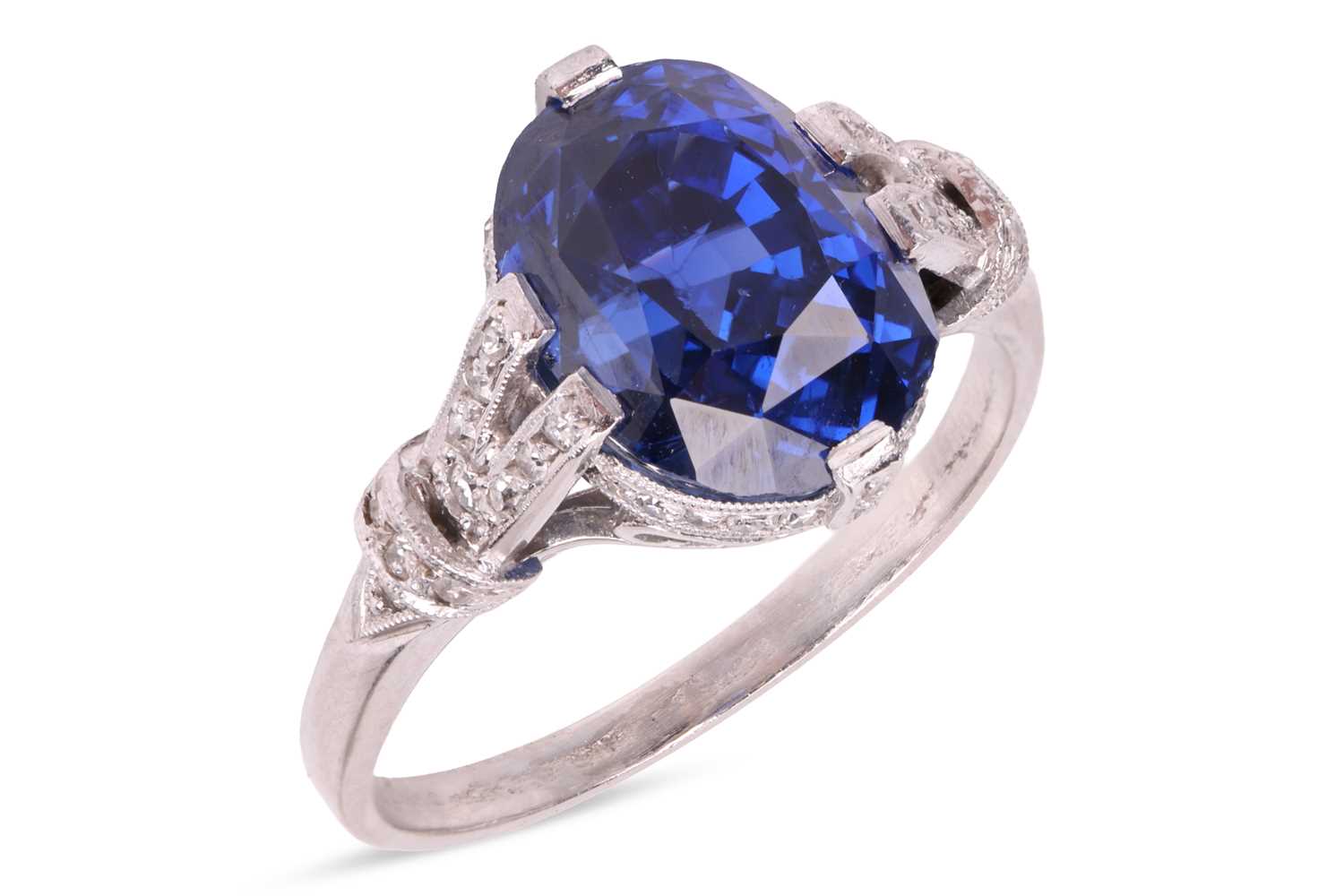 Lot 53 - An unheated Ceylon sapphire and diamond dress...