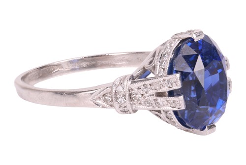 Lot 53 - An unheated Ceylon sapphire and diamond dress...