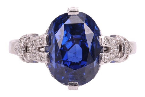 Lot 53 - An unheated Ceylon sapphire and diamond dress...
