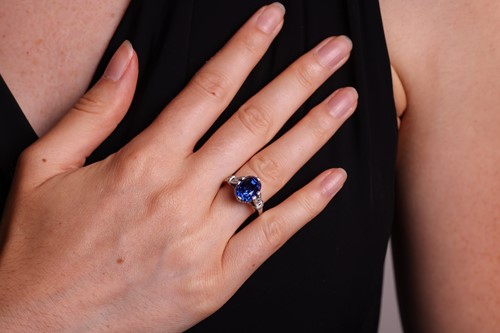 Lot 53 - An unheated Ceylon sapphire and diamond dress...