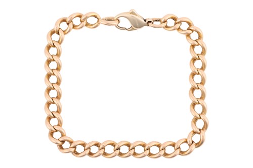 Lot 112 - A curb link bracelet, comprising a series of...