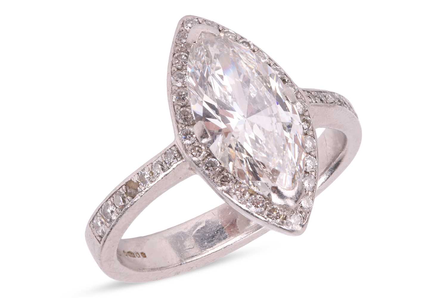 Lot 190 - A marquise-cut diamond ring, featuring a...