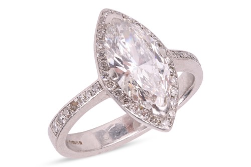 Lot 190 - A marquise-cut diamond ring, featuring a...
