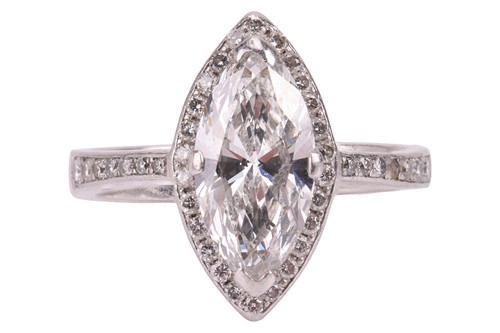 Lot 190 - A marquise-cut diamond ring, featuring a...