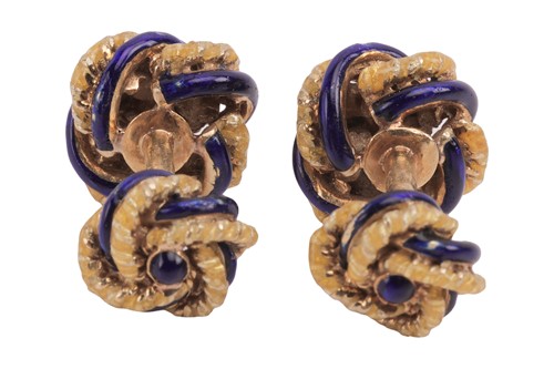 Lot 62 - A pair of enamel knot cufflinks, the knot...