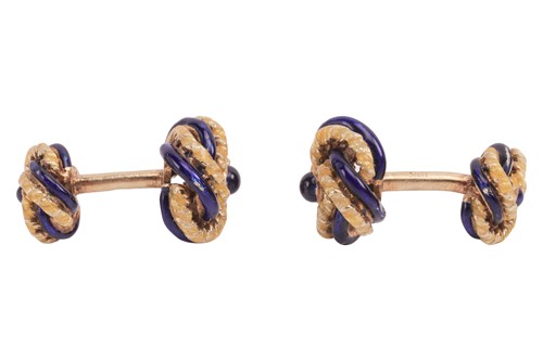 Lot 62 - A pair of enamel knot cufflinks, the knot...