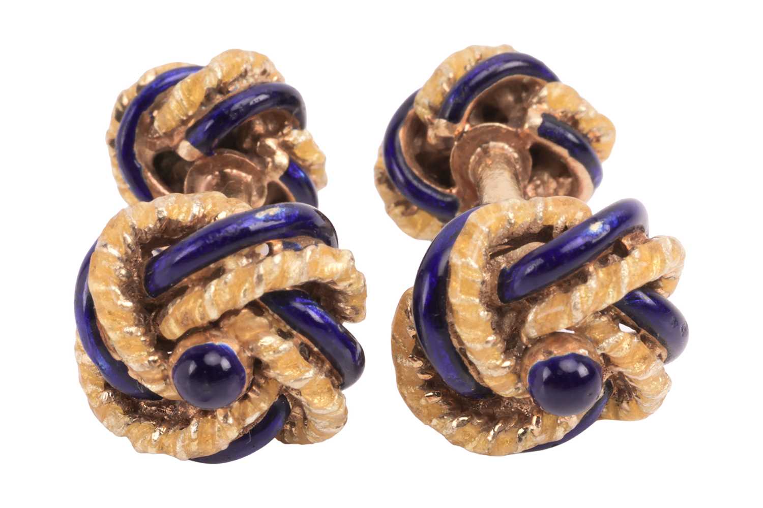 Lot 62 - A pair of enamel knot cufflinks, the knot...