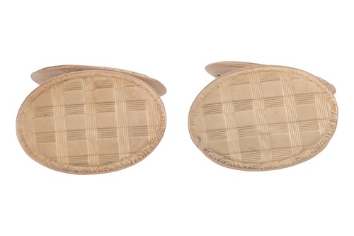 Lot 15 - A pair of cufflinks, the oval panels with...