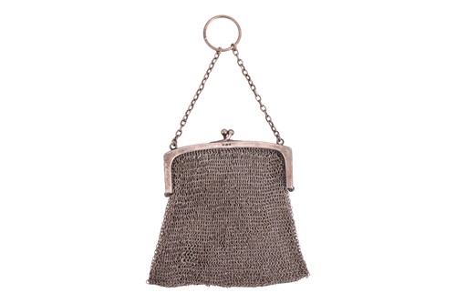 Lot 244 - A small silver mesh coin purse, with kiss lock...