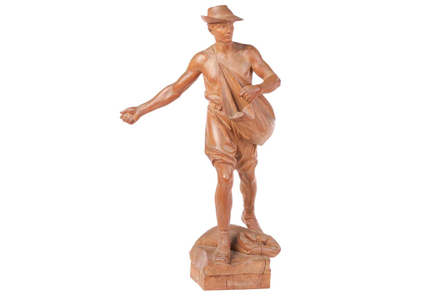 Lot 65 - A large carved fruit wood figure, 'The Sower',...