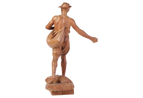 Lot 65 - A large carved fruit wood figure, 'The Sower',...
