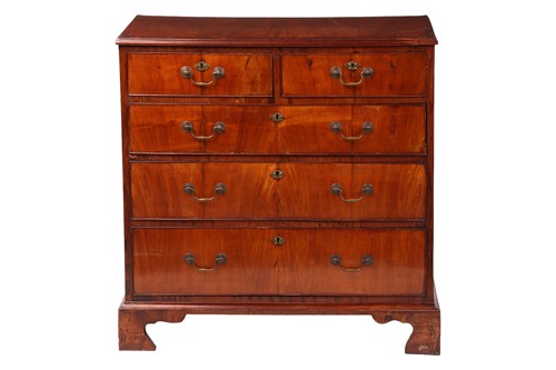 Lot 43 - A George III walnut chest of drawers, with two...