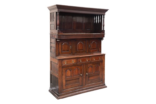 Lot An early 18th-century oak tridarn, with arched...
