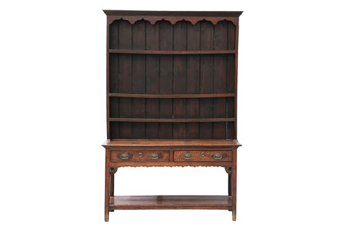 Lot An early 19th-century oak dresser, the rack...