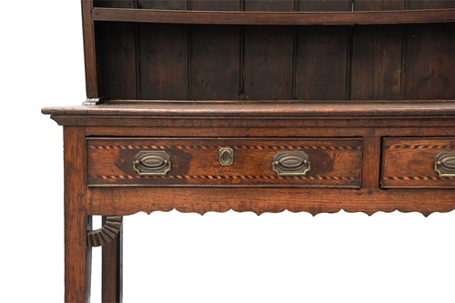 Lot 47 - An early 19th-century oak dresser, the rack...