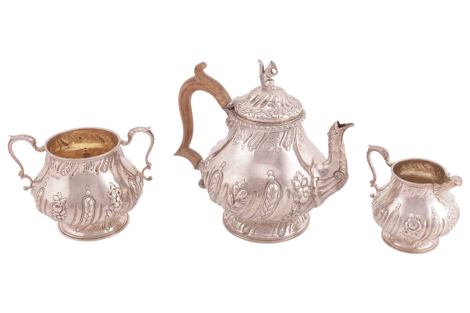 Lot 250 - A Victorian silver three-piece tea service,...