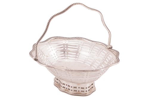 Lot 239 - An Edwardian small silver basket or sweetmeat...