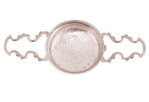 Lot 229 - A George II silver lemon strainer, London 1755,...