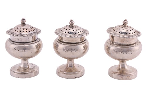 Lot 228 - A set of three Indian Colonial compressed vase...