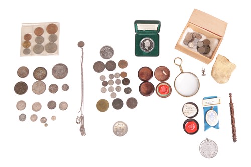 Lot 181 - A small collection of coins and tokens, to...