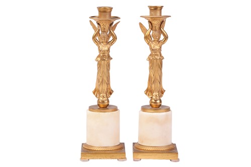 Lot A pair of Empire ormolu candelabra, winged...