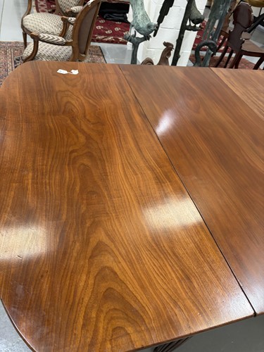 Lot 20 - A Regency mahogany extending dining table, in...