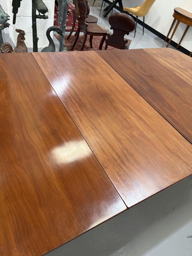 Lot 20 - A Regency mahogany extending dining table, in...