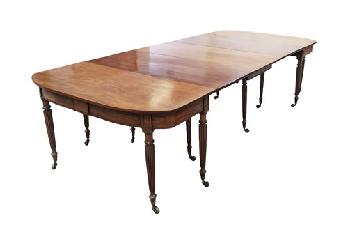 Lot 20 - A Regency mahogany extending dining table, in...