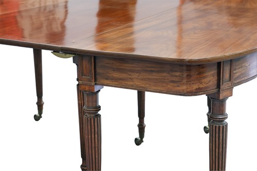 Lot 20 - A Regency mahogany extending dining table, in...