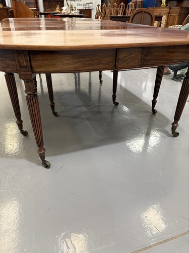 Lot 20 - A Regency mahogany extending dining table, in...