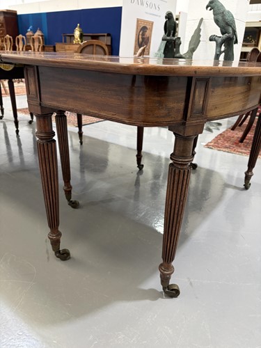 Lot 20 - A Regency mahogany extending dining table, in...