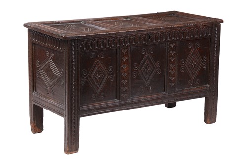Lot 45 - An 18th-century oak triple-panel carved coffer,...