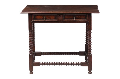 Lot 52 - An 18th-century oak side table, with panelled...