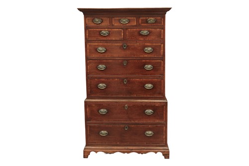 Lot 53 - An early 19th-century crossbanded oak chest on...