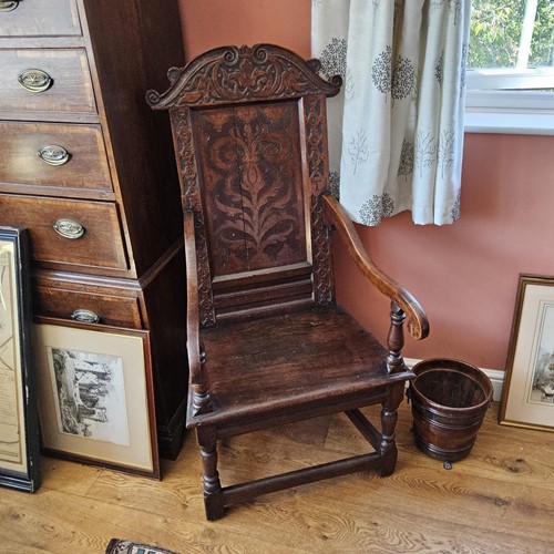 Lot 41 - An 18th-century oak wainscot chair, with a...