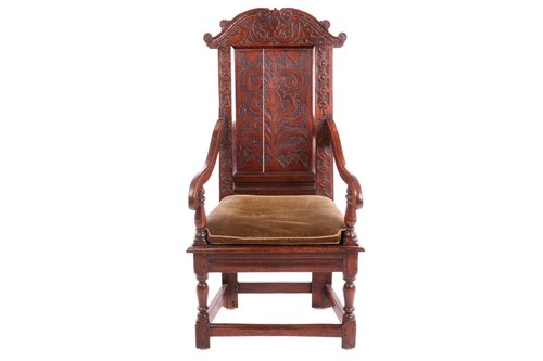 Lot An 18th-century oak wainscot chair, with a...