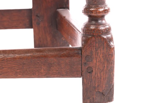 Lot 41 - An 18th-century oak wainscot chair, with a...