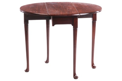 Lot 51 - An early George III mahogany oval gateleg...