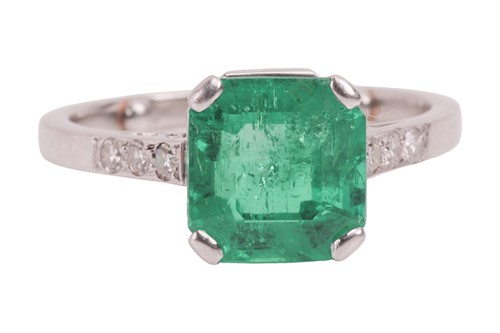Lot 57 - A Colombian emerald dress ring, claw-set with...