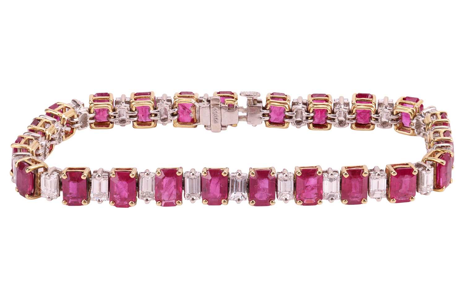 Lot 111 - A ruby and diamond line bracelet, set with...