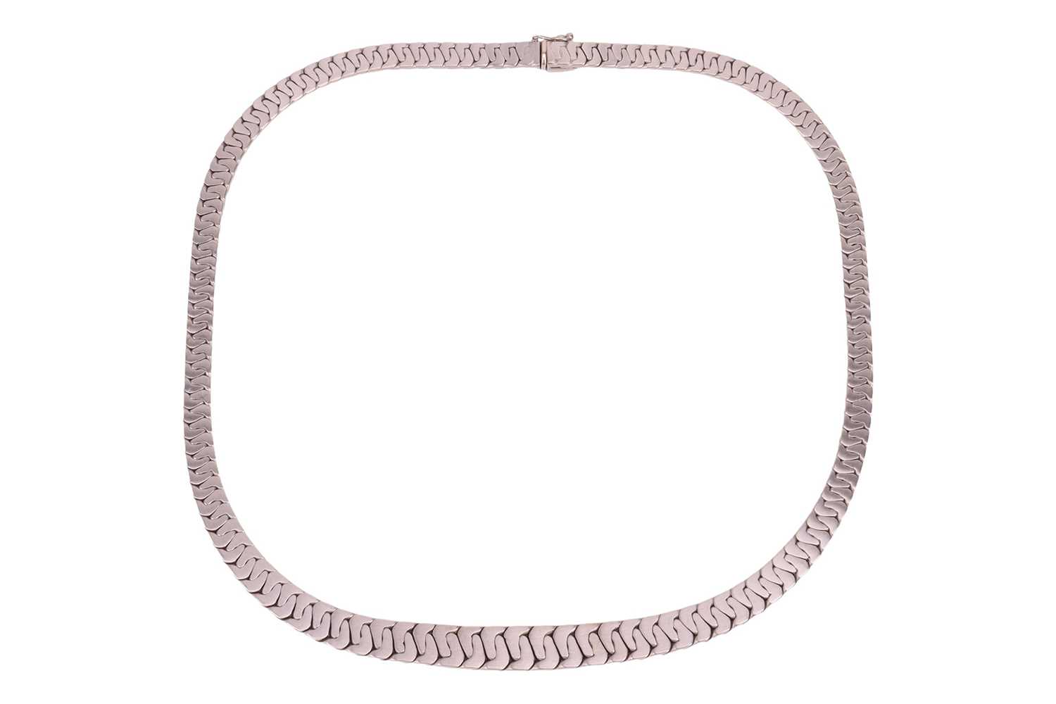 Lot 134 - A flat curb-link chain collar necklace,...
