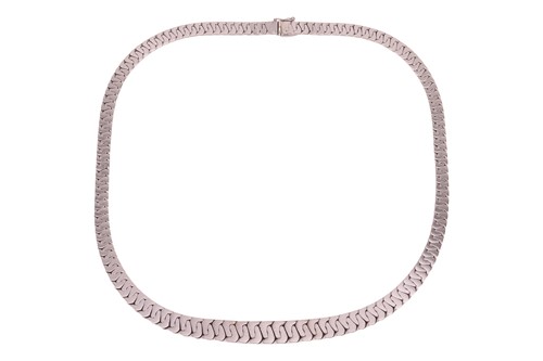 Lot 134 - A flat curb-link chain collar necklace,...