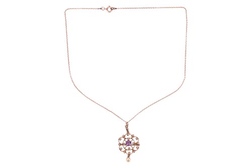 Lot 21 - An amethyst and seed pearl pendant necklace,...